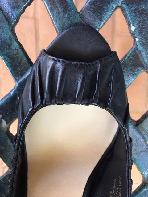 Black peep-toe sling back heels