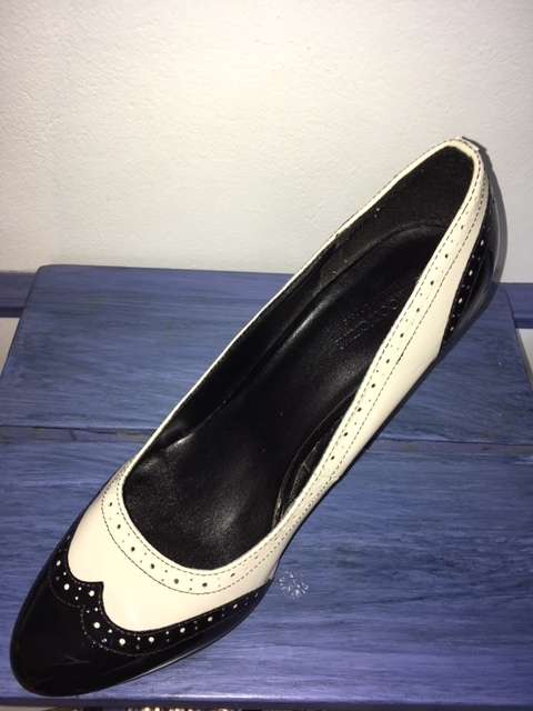 Black and white brogue heels
