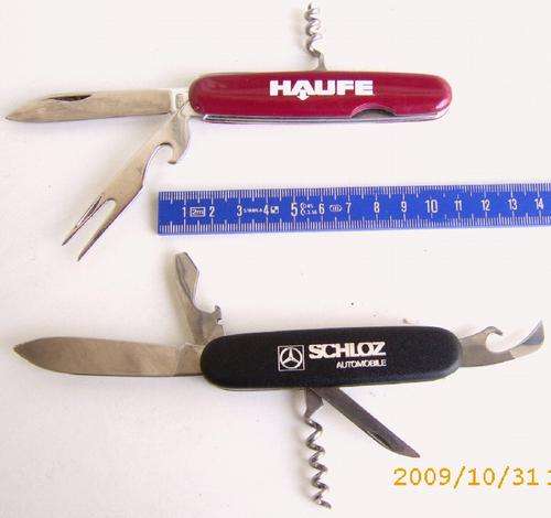 Two pocket Knives. One from a Mercdes dealer in Germany.
