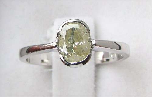 **BARGAIN BUY [R22528]** OVAL CUT [0.580ct] TUBED DIAMOND RING [WHITE GOLD] - BUY SAFE