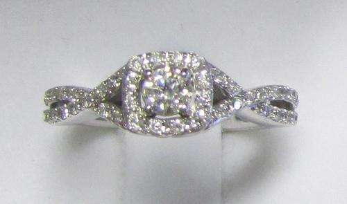 **SCINTILLATING [R34698]** EYE CLEAN [0.625ct] TWIST DIAMOND RING [3.127g] WHITE GOLD - BUY SAFE