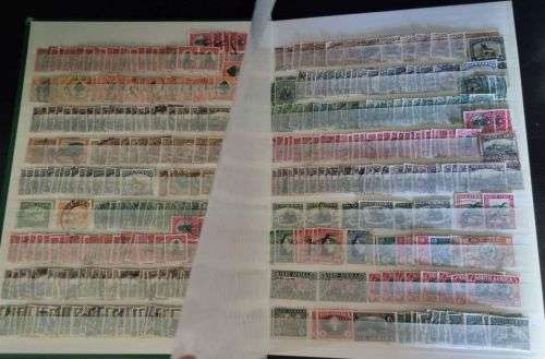 A4 Stock Album stacked with mostly used Union and RSA stamps