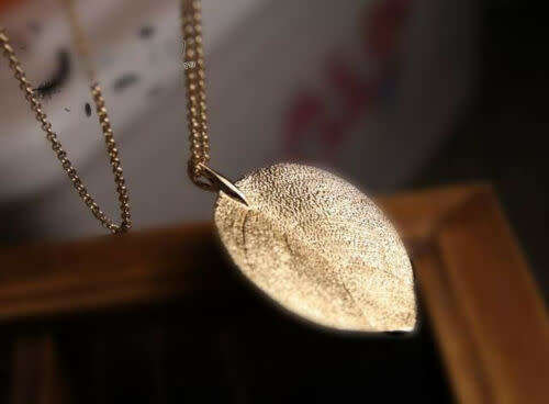 Stunning Gold leaf pendant and chain longer length
