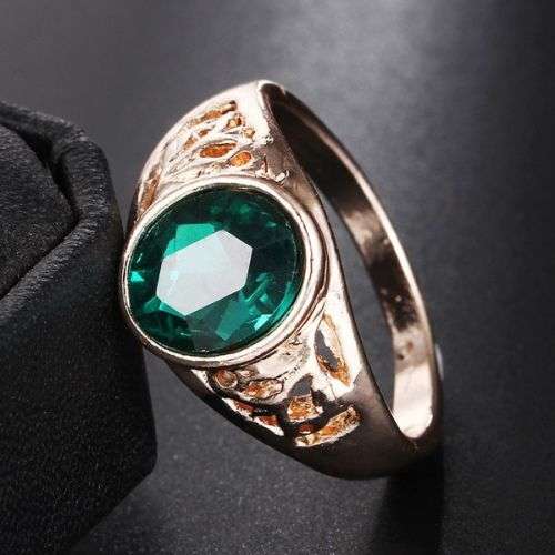 Stunning Gold Tone Sim emerald cut out ring