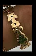 Stunning Daisy chain gold plated ring