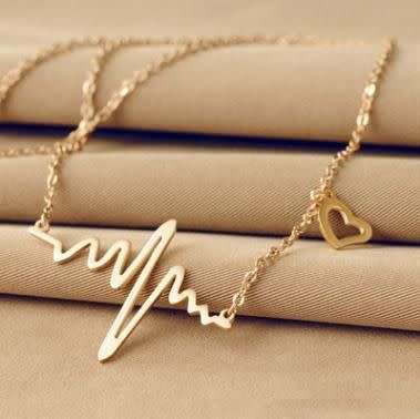 Gorgeous 9ct gold plated heartbeat necklace with heart charm