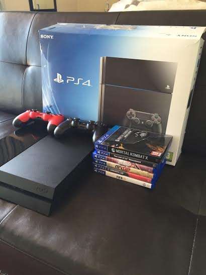 Virtually Brand New PS4 Console, Two Remotes Six Games
