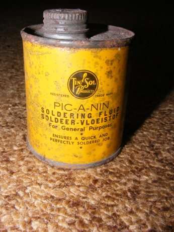 PIC - A- NIN soldering fluid tin. rusted with some fluid still inside.