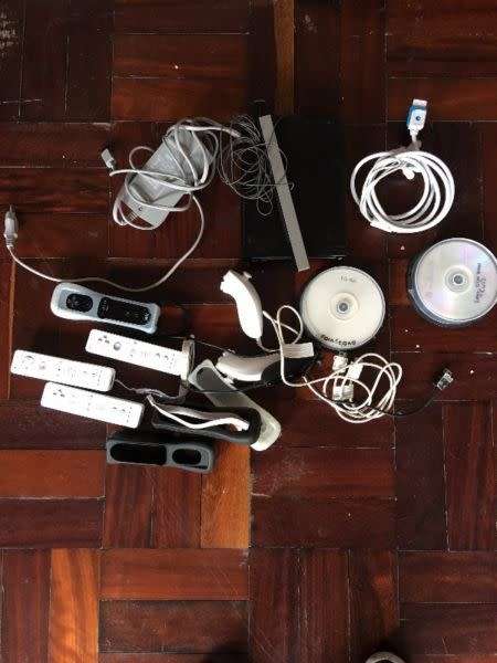 Wii console (Modified), all cabling, 4 controllers, 3 nunchucks and over 30 Games