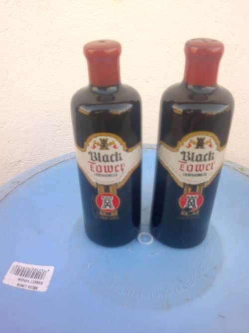 VINTAGE SET OF BLACK TOWER SALT AND PEPPER HOLDER