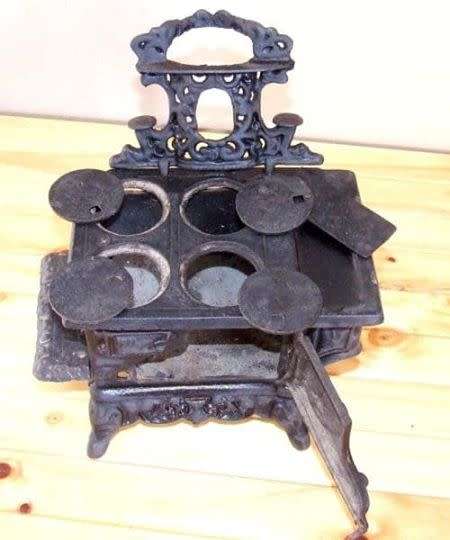Doll's "Crescent" Coal Stove No cracks or breaks but would need a scrub