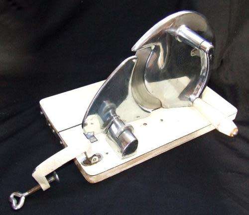 1950'S Geman Bread Slicer,Good working condition. Drop down base and table clamp