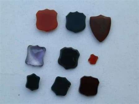 Lovely lot of 9 unset gemstone shields - blood stone, carnelian, amethyst.