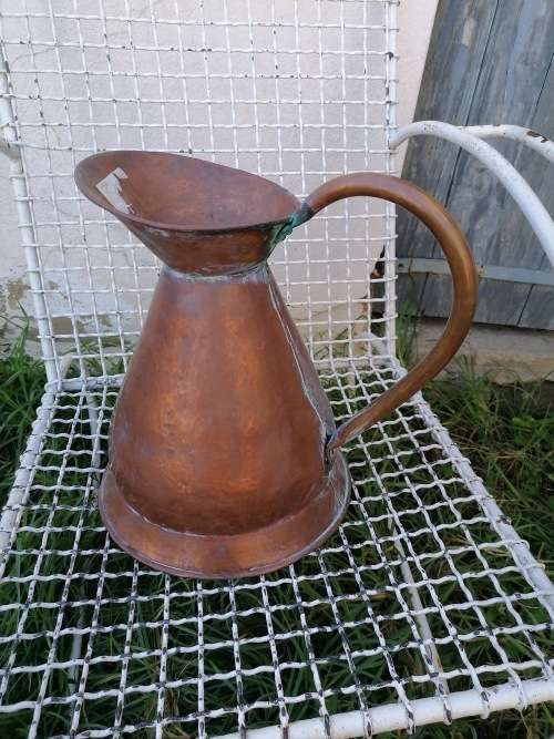 large copper water jug