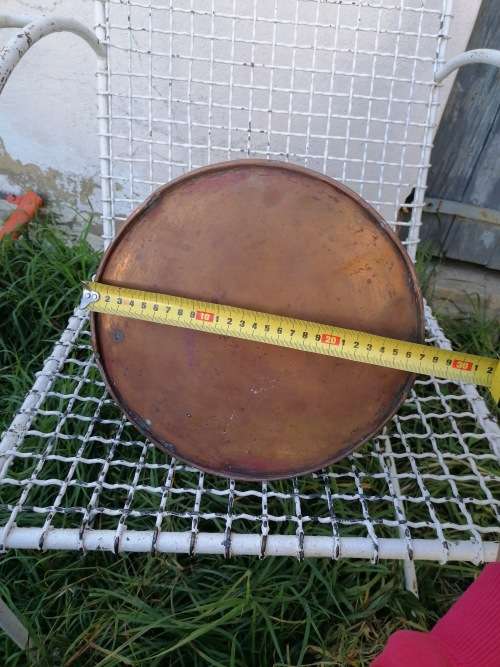 large copper water jug