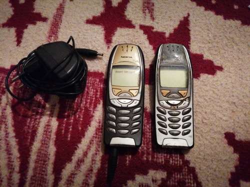 Nokia model 6310i with a original house charger as well and one phone for parts
