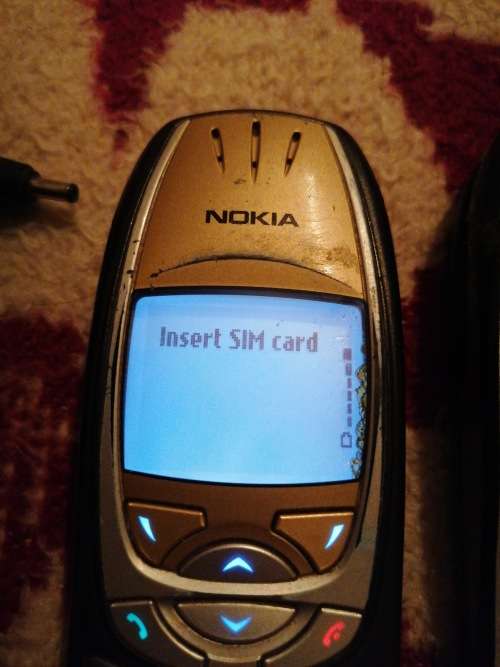 Nokia model 6310i with a original house charger as well and one phone for parts