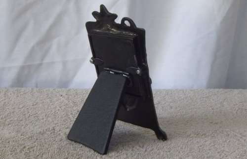 A HEART WARMING CARROL BOYES STYLE METAL FRAME WITH MAKERS MARKS AND DATED 1997