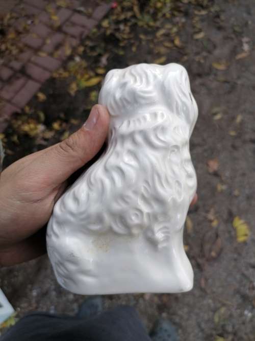 Royal Doulton dog porcelain figure. Have been repaired