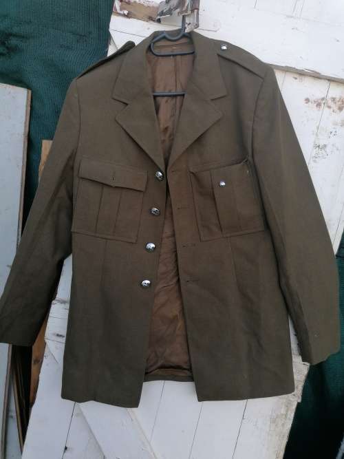 Border war tunic with paper work