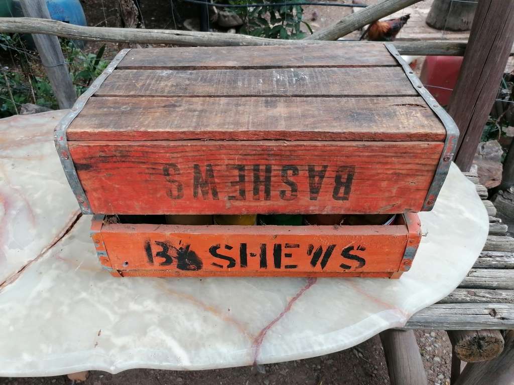Vintage Bashews Crate with 24 original bottles 23 still have original content. Very rare
