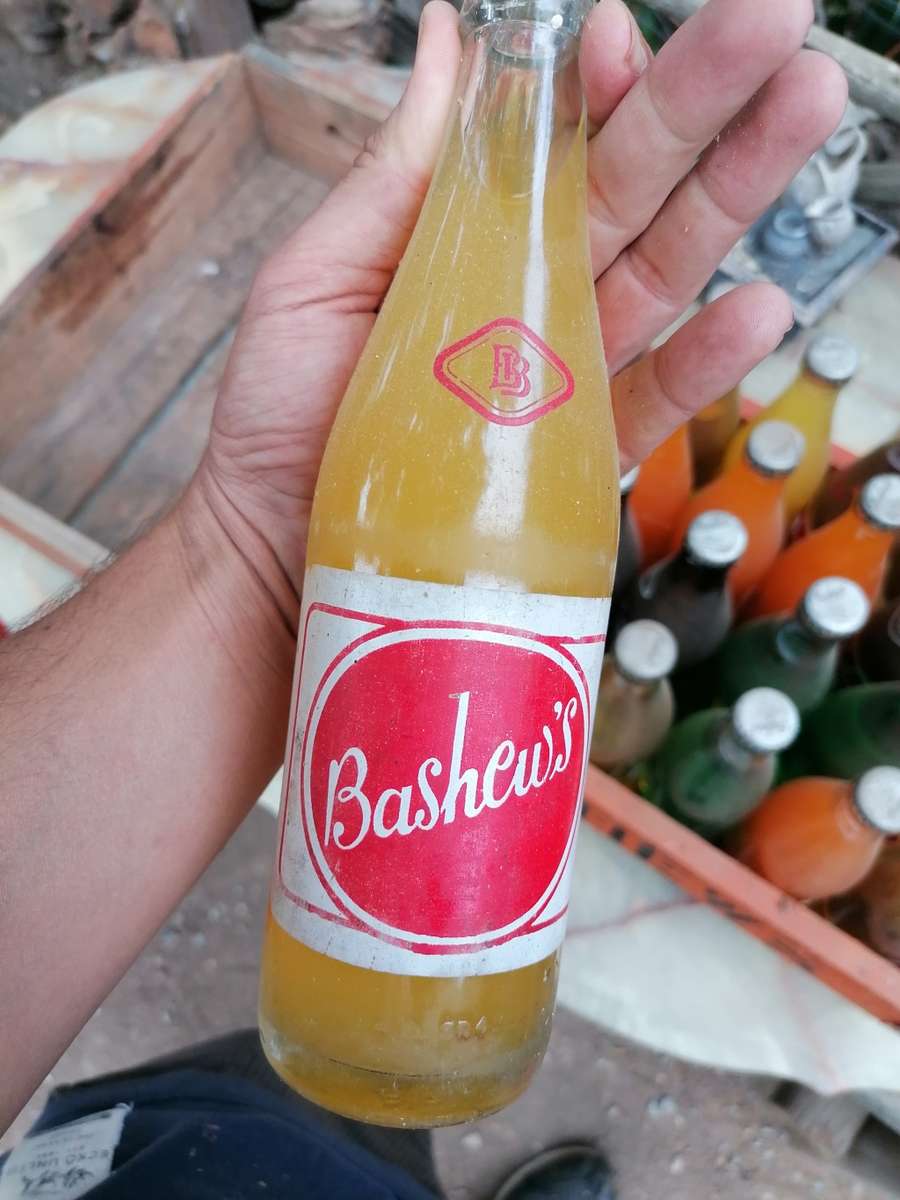 Vintage Bashews Crate with 24 original bottles 23 still have original content. Very rare