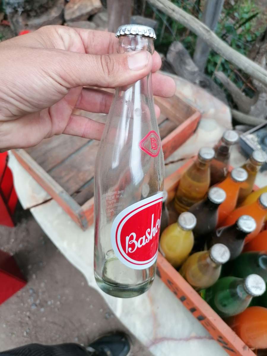 Vintage Bashews Crate with 24 original bottles 23 still have original content. Very rare