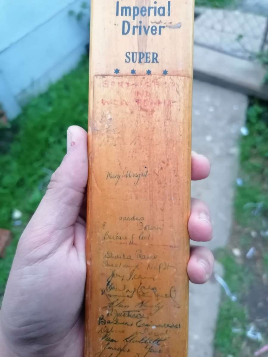 Signed minature cricket at. Appears to be dated 1960s