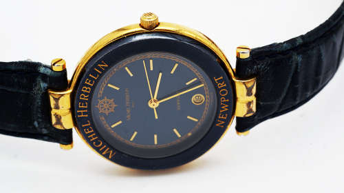 Black Friday. Michel Herbelin Newport (Stunning). Deep blue with with scratchproof Sapphire glass.