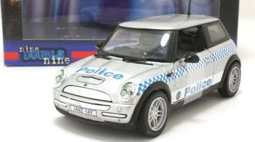 4 x Mini Cooper Police Cars: : "Police cars of the world"