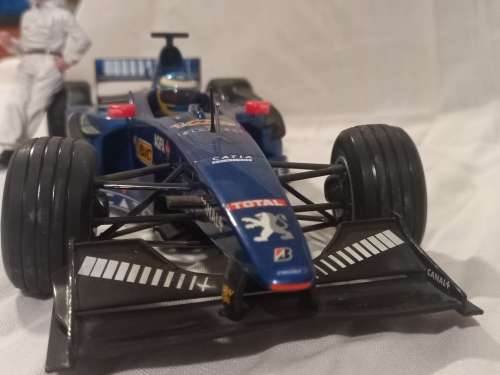 Prost Peugeot AP02 1999 J.Button