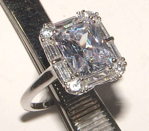 PURE PERFECTION! SOLID .925 STERLING SILVER RING WITH SIMULATED DIAMONDS!