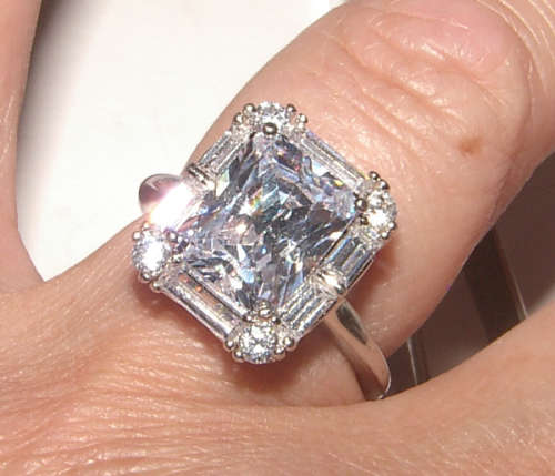 PURE PERFECTION! SOLID .925 STERLING SILVER RING WITH SIMULATED DIAMONDS!