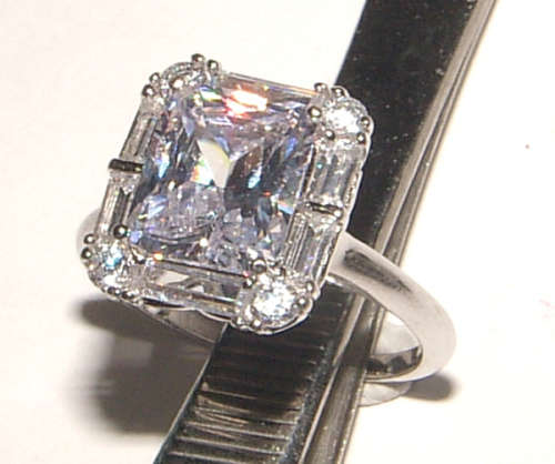 PURE PERFECTION! SOLID .925 STERLING SILVER RING WITH SIMULATED DIAMONDS!