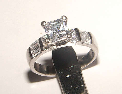 PURE PERFECTION! SOLID .925 STERLING RING WITH SIMULATED DIAMONDS!