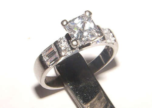 PURE PERFECTION! SOLID .925 STERLING RING WITH SIMULATED DIAMONDS!