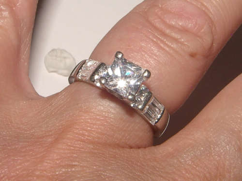 PURE PERFECTION! SOLID .925 STERLING RING WITH SIMULATED DIAMONDS!