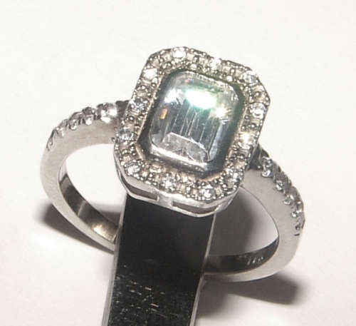 PURE PERFECTION! SOLID .925 STERLING SILVER RING WITH SIMULATED DIAMONDS!