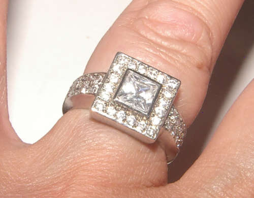 PURE PERFECTION! SOLID .925 STERLING SILVER RING WITH SIMULATED DIAMONDS!