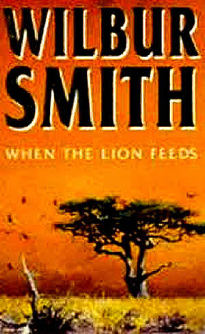 PAPERBACK - WILBUR SMITH - WHEN THE LION FEEDS (CONDITION NEW)