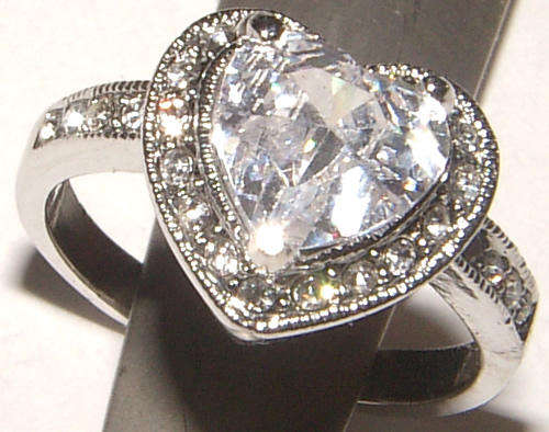 **SIZE 7.25**BEAUTIFUL CZ AND RHINESTONE ENCRUSTED DRESS RING!