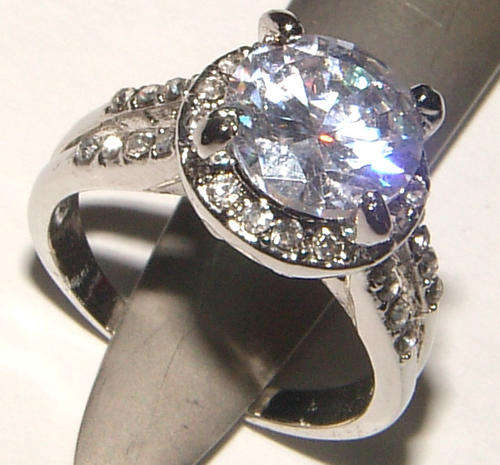 **SIZE O 1/2**BEAUTIFUL CZ AND RHINESTONE ENCRUSTED DRESS RING!