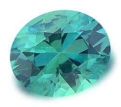 NATURAL PARAIBA TOPAZ - NEON GREEN BLUE OVAL CUT - 5.540cts!!