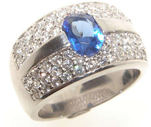 BLUE SAPPHIRE AND WHITE CZ STERLING SILVER RING.