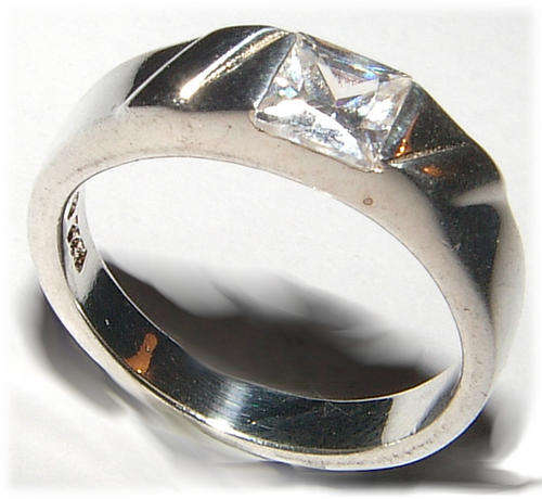 WHITE CZ STERLING SILVER RING.