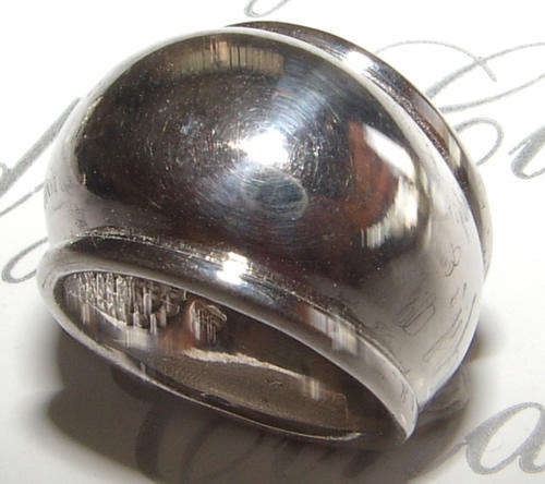 BROAD SOLID STERLING SILVER BALI RING.