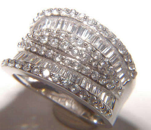 WHITE CZ STERLING SILVER RING.