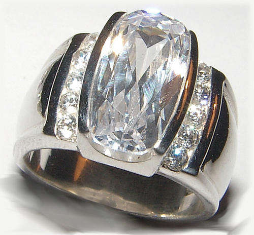 WHITE CZ STERLING SILVER RING.