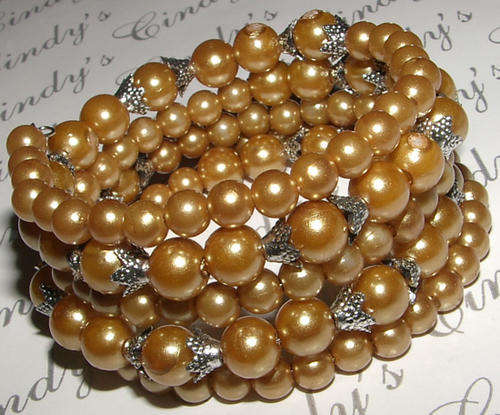 MULTI STRAND PEARLY BEADED BRACELET!