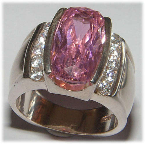 PINK SAPPHIRE AND CZ STERLING SILVER RING.